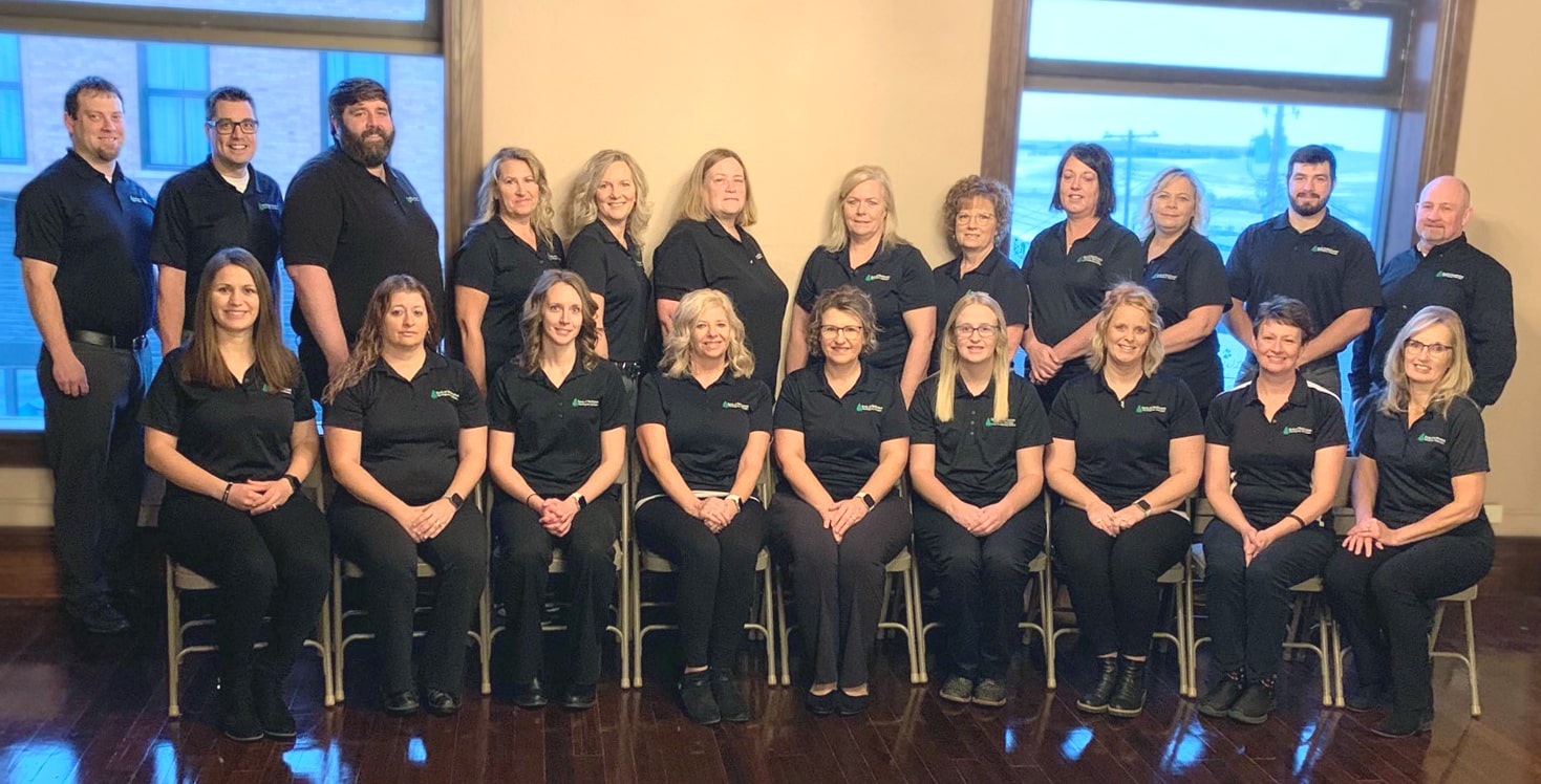 Bank of Hartington employees sitting for a photo